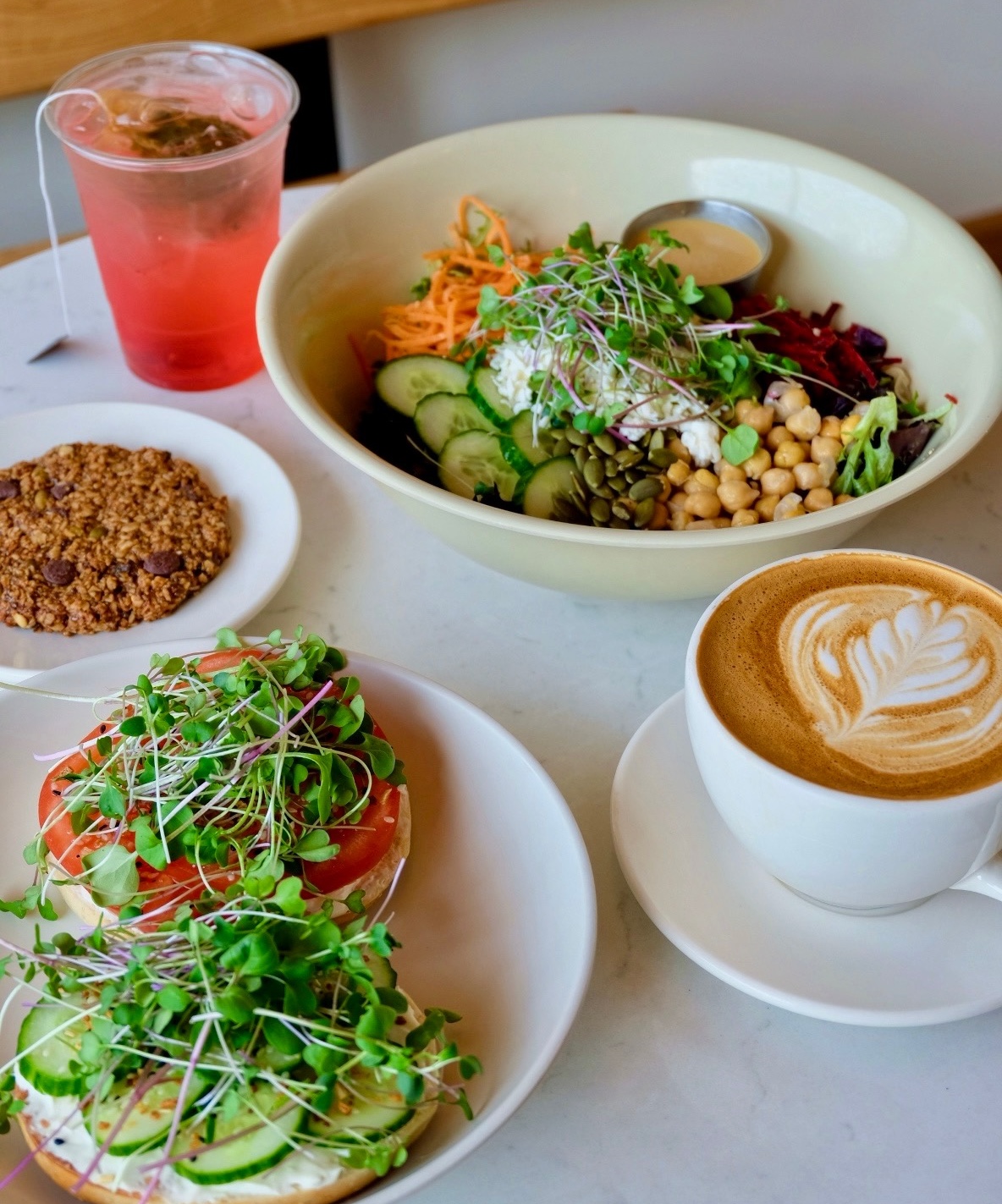 House salad, open-faced bagel, gluten-free cookie, and latte