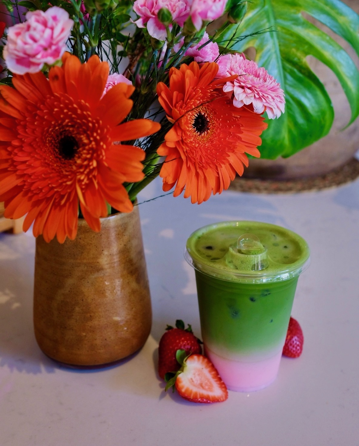 Iced strawberry matcha latte